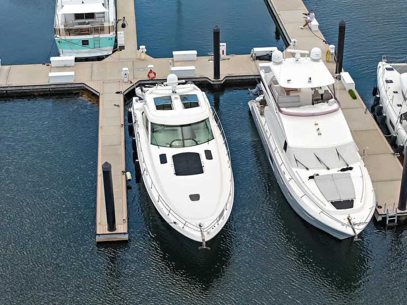 Slide: The Image of 2006 Sea Ray 60 Sundancer yacht docked at marina, aerial view. - 40