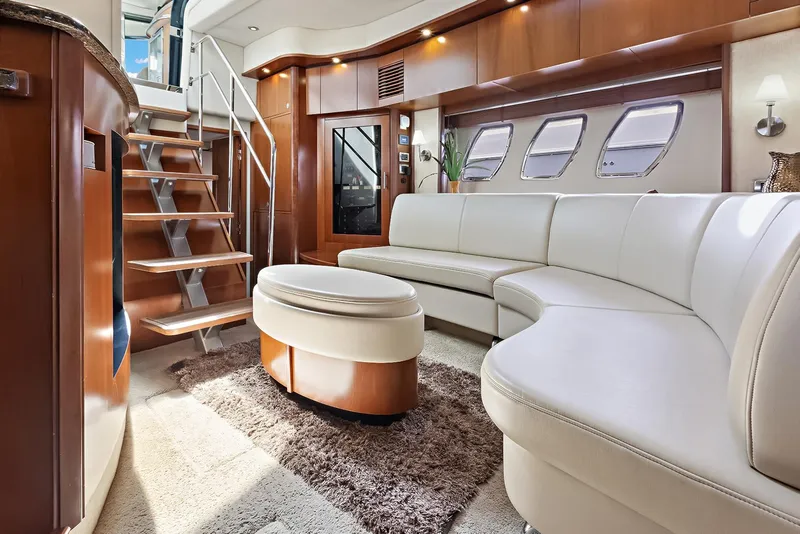 Slide: The Image of Luxurious interior of 2006 Sea Ray 60 Sundancer yacht with elegant seating and modern design. - 5