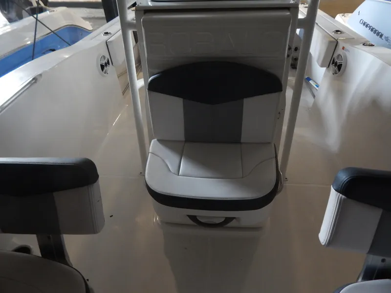 Slide: The Image of 2019 Robalo R202 Explorer boat interior with seating and speakers. - 11