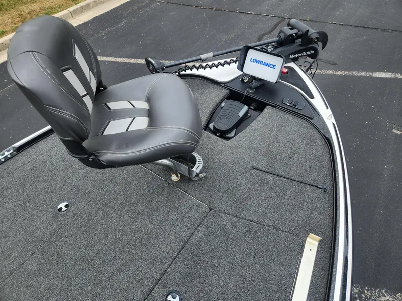 Slide: The Image of Fishing boat deck with a gray seat, Lowrance display, and MotorGuide trolling motor. Nitro Z17, 2017 model. - 3