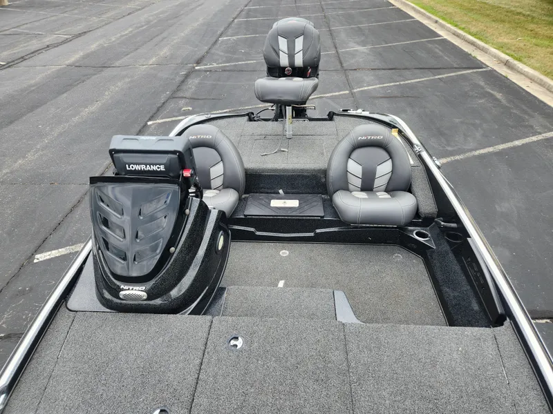 Slide: The Image of 2017 Nitro Z17 boat with Lowrance equipment, featuring gray seating and spacious deck. - 4