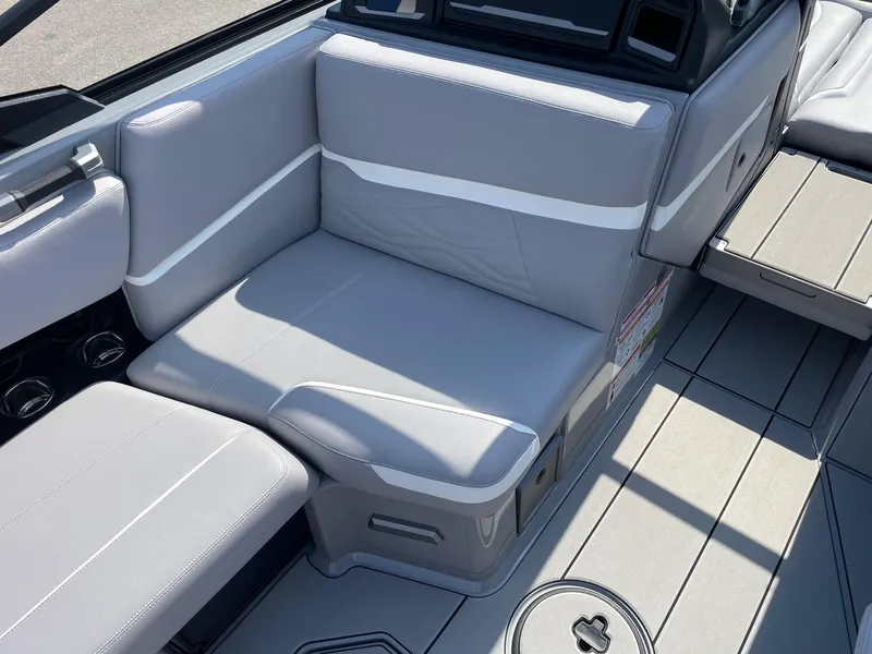 Slide: The Image of 2025 Supra SL boat interior with gray seating and modern design. - 6