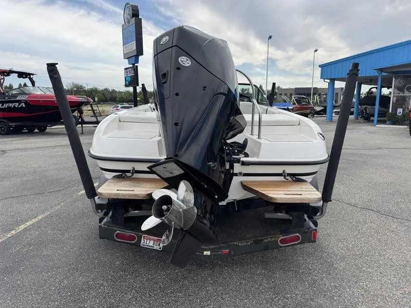 Slide: The Image of 1999 MasterCraft Powerstar 200 boat on trailer, rear view with outboard motor. - 6