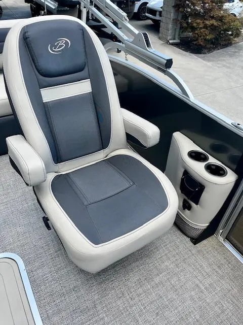 Slide: The Image of 2023 Barletta Cabrio 22UC boat seat with cup holders and armrests. - 11