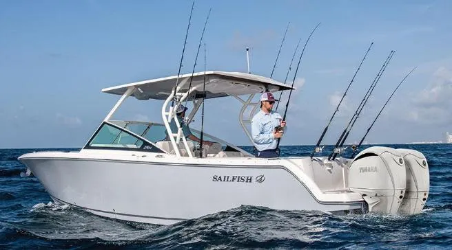 The Image of 2026 Sailfish 276 DC boat on ocean with fishing rods and Yamaha engines. - 1