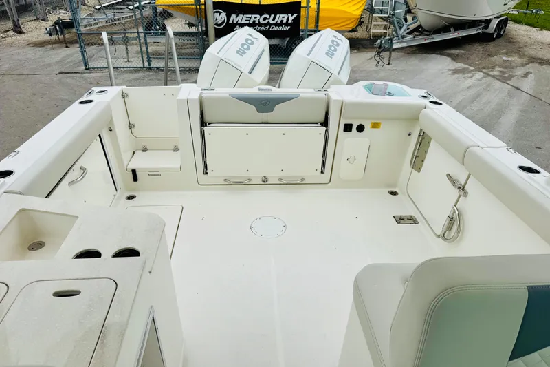 Slide: The Image of 2026 Sailfish 276 DC boat interior with seating and storage compartments. - 37