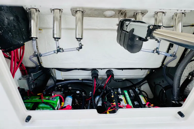 Slide: The Image of Engine compartment of 2026 Sailfish 276 DC boat with batteries and wiring. - 7
