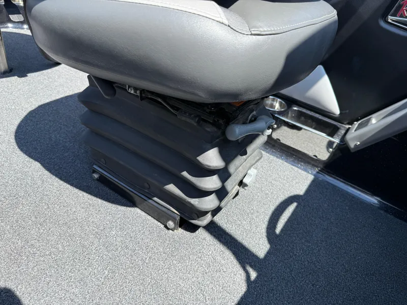 Slide: The Image of 2022 Ranger 1880MS boat seat with adjustable base on carpeted floor. - 34