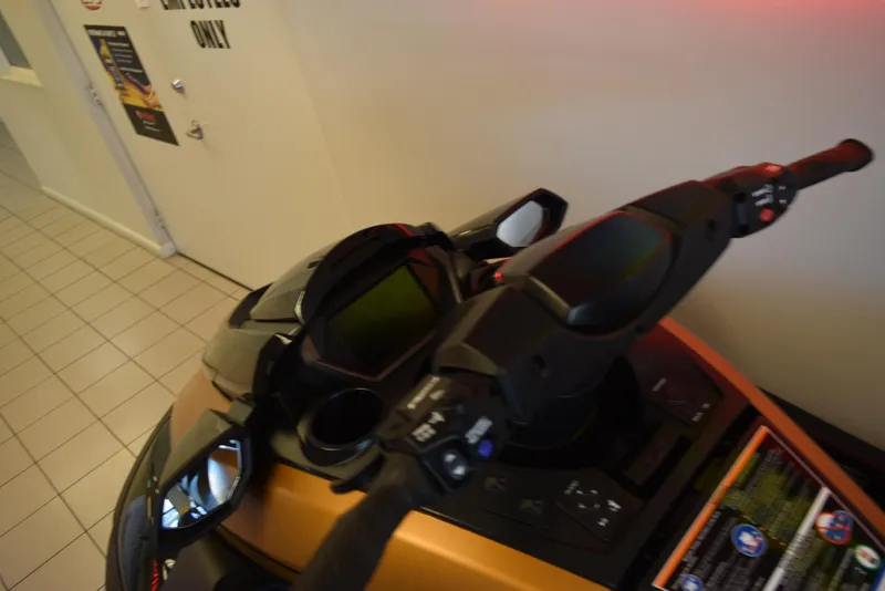 Slide: The Image of 2025 Yamaha WaveRunner FX Cruiser HO dashboard and controls in showroom setting. - 11