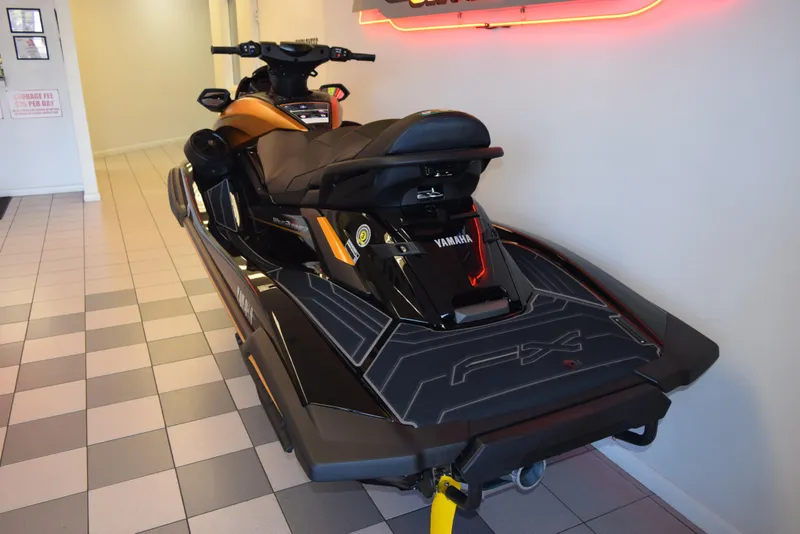 Slide: The Image of 2025 Yamaha WaveRunner FX Cruiser HO in showroom, rear view. - 9