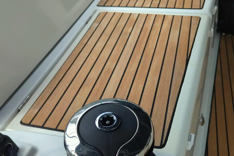 Slide: The Image of Teak deck detail on 2021 Jeanneau Sun Odyssey 440 sailboat. - 15