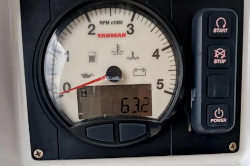 Slide: The Image of Yanmar RPM gauge and controls on 2021 Jeanneau Sun Odyssey 440 sailboat. - 44