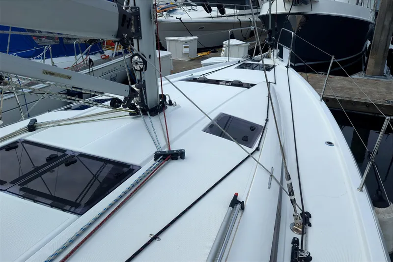 Slide: The Image of Jeanneau Sun Odyssey 440 sailboat deck, 2021 model, docked at marina. - 5