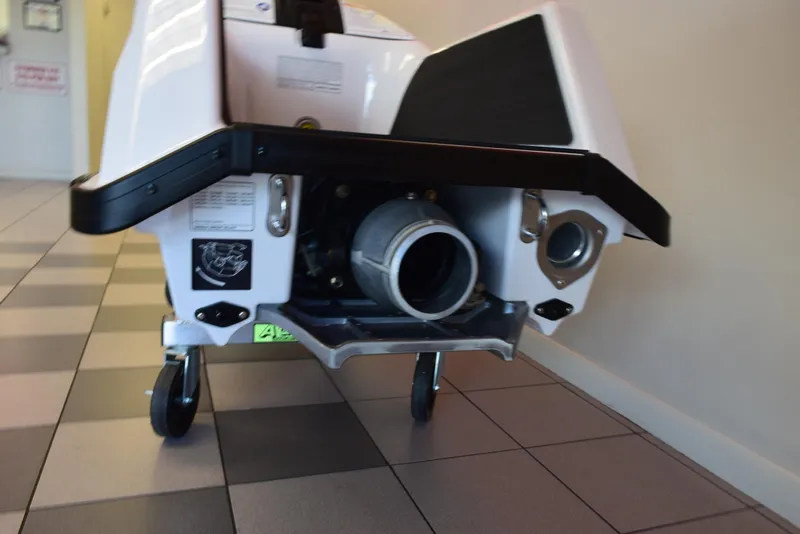 Slide: The Image of 2025 Yamaha WaveRunner SuperJet rear view on display indoors. - 14