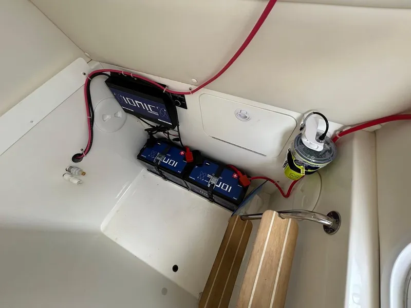Slide: The Image of 2019 Regulator 23 boat battery compartment with Ionic batteries and wiring. - 20