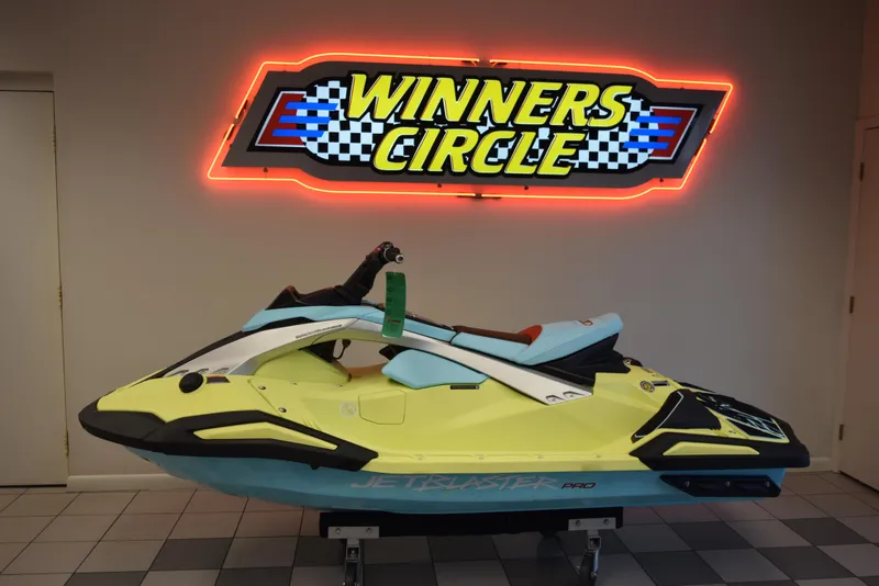 The Image of 2025 Yamaha WaveRunner JetBlaster PRO 2-Up displayed under "Winners Circle" neon sign. - 0