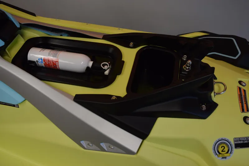 Slide: The Image of 2025 Yamaha WaveRunner JetBlaster PRO 2-Up storage compartment with fire extinguisher. - 14