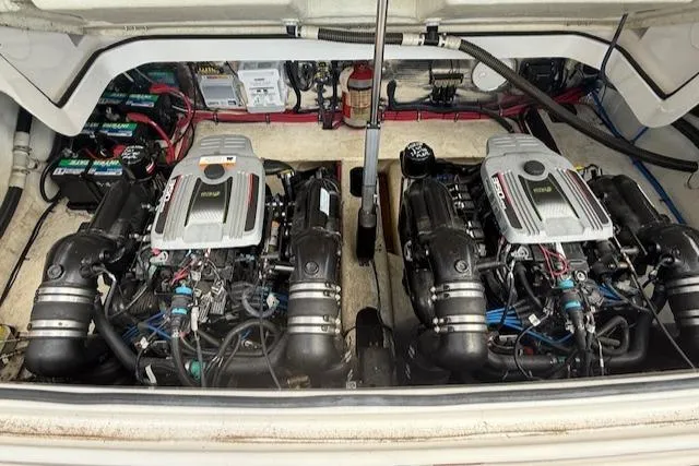 Slide: The Image of Engine compartment of a 2013 Regal 3200 Bowrider with dual inboard motors. - 29