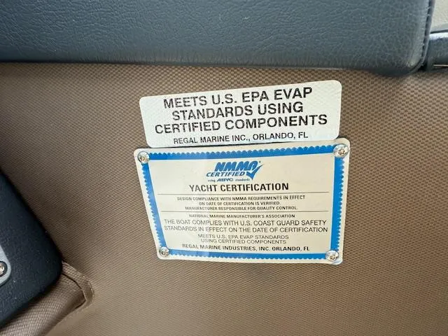 Slide: The Image of 2013 Regal 3200 Bowrider yacht certification label, meets U.S. EPA standards, Orlando, FL. - 34