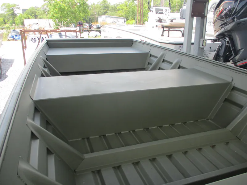 Slide: The Image of 2025 Alweld 1448 DS boat interior with bench seats and storage compartments. - 10