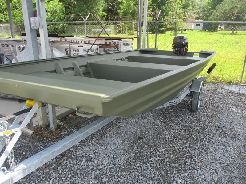Slide: The Image of 2025 Alweld 1448 DS boat on trailer, parked outdoors on gravel. - 11