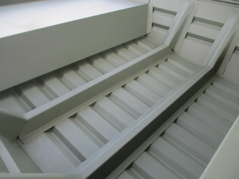 Slide: The Image of 2025 Alweld 1448 DS boat interior showcasing durable aluminum construction and ribbed flooring. - 12