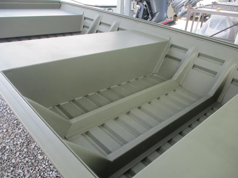 Slide: The Image of 2025 Alweld 1448 DS boat interior with aluminum seating and flooring. - 13