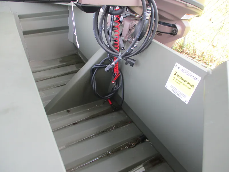 Slide: The Image of 2025 Alweld 1448 DS boat interior with wiring and capacity label. - 14