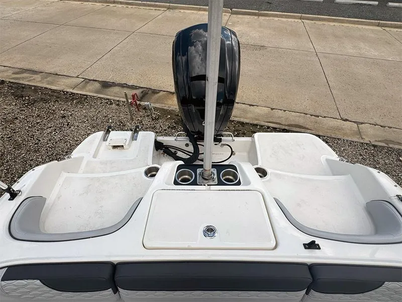 Slide: The Image of 2023 Bayliner Element M17 boat stern view with motor and seating. - 7