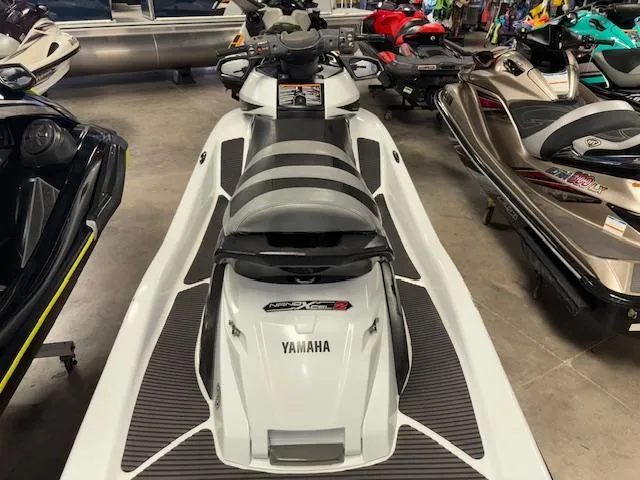 Slide: The Image of 2015 Yamaha WaveRunner FX Cruiser SVHO in showroom, surrounded by other jet skis. - 7