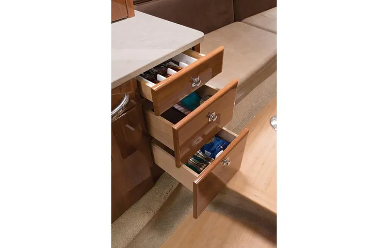 Slide: The Image of Manufacturer Provided Image: Open drawers in the cabin of a 2015 Formula 370 Super Sport boat. - 18
