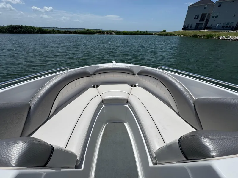 Slide: The Image of 2007 Yamaha Boats AR230 HO bow seating area on calm water. - 10