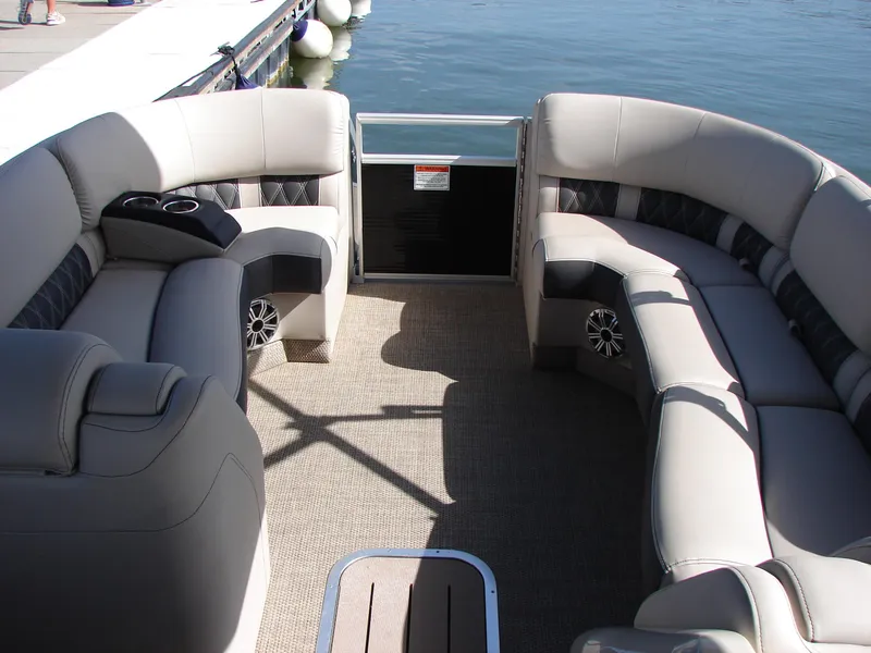 Slide: The Image of 2019 Bennington Q 25 QSBIO pontoon boat interior with plush seating and cup holders. - 14