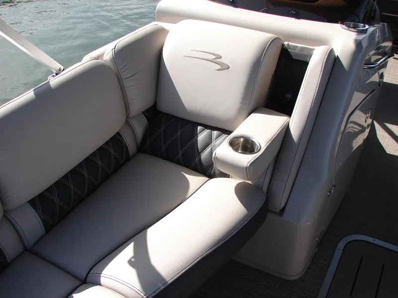 Slide: The Image of Luxurious seating on a 2019 Bennington Q 25 QSBIO boat with cup holder. - 38