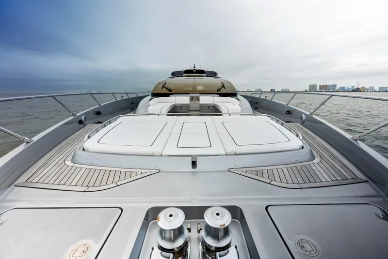 Slide: The Image of Riva 88' FOLGORE 2021 luxury yacht deck with modern design on open water. - 16