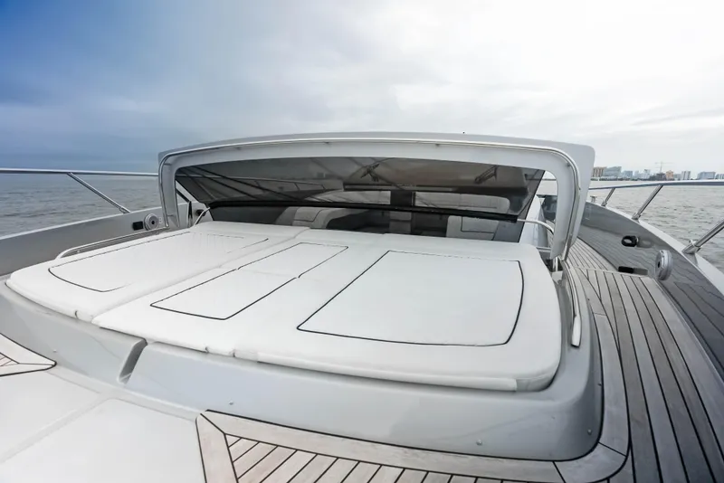 Slide: The Image of Luxury deck of 2021 Riva 88' FOLGORE yacht with sunbathing area. - 17