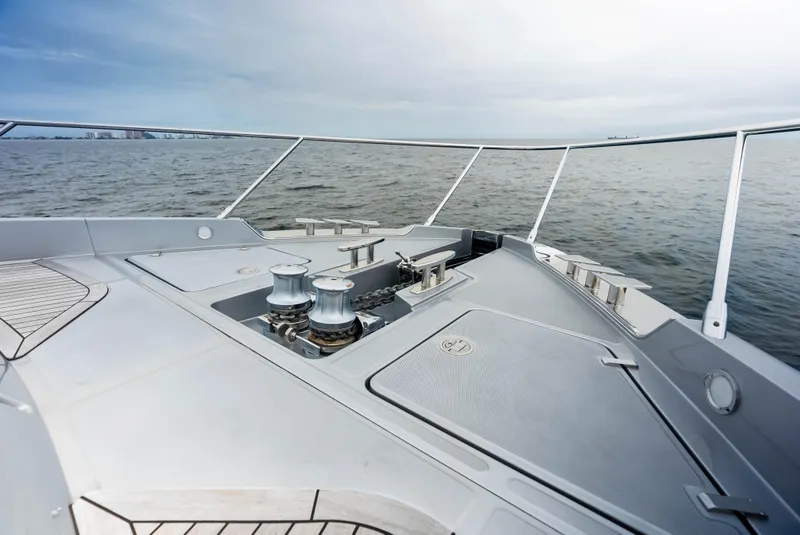 Slide: The Image of Bow deck of 2021 Riva 88' FOLGORE yacht on open water. - 18
