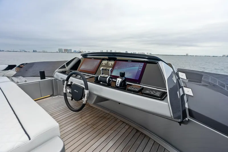 Slide: The Image of Cockpit of 2021 Riva 88' FOLGORE yacht with advanced navigation systems. - 22