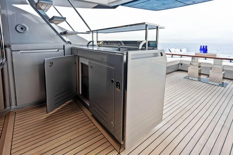 Slide: The Image of Outdoor kitchen on the 2021 Riva 88' FOLGORE yacht with ocean view. - 25
