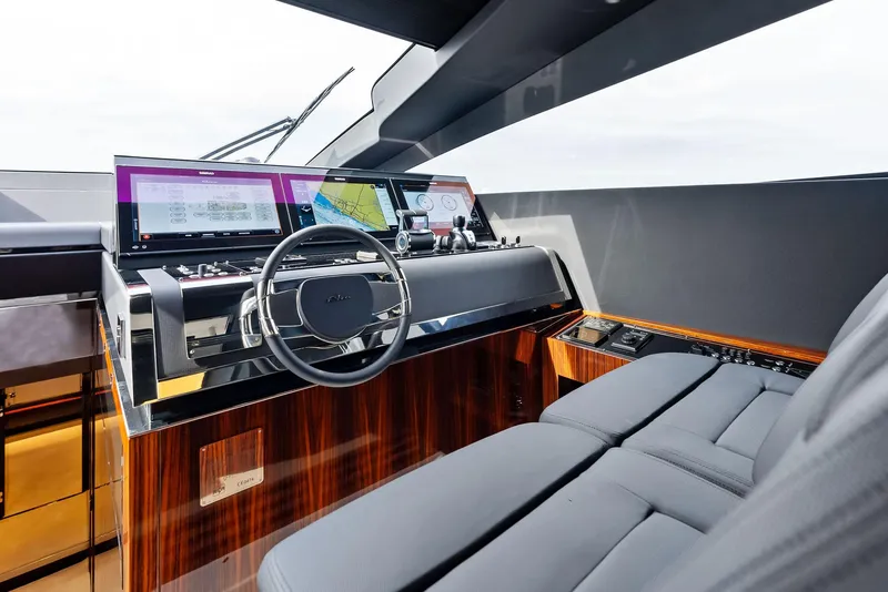 Slide: The Image of Modern cockpit of 2021 Riva 88' FOLGORE yacht with advanced navigation systems. - 32