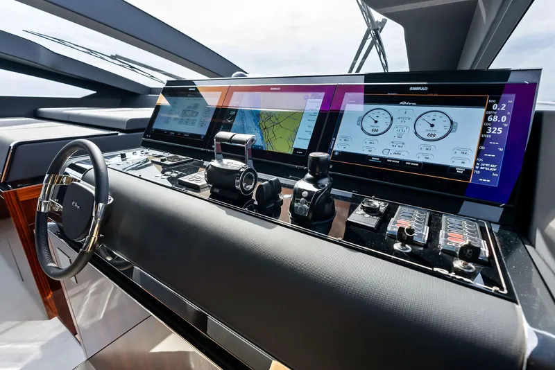 Slide: The Image of Modern helm station of 2021 Riva 88' FOLGORE yacht with advanced navigation displays. - 33