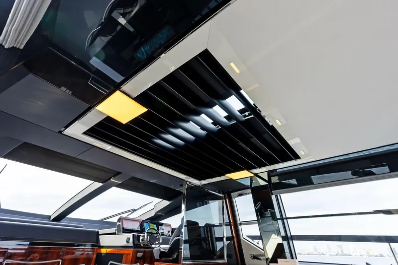 Slide: The Image of Interior view of 2021 Riva 88' FOLGORE yacht with modern design and skylight. - 34