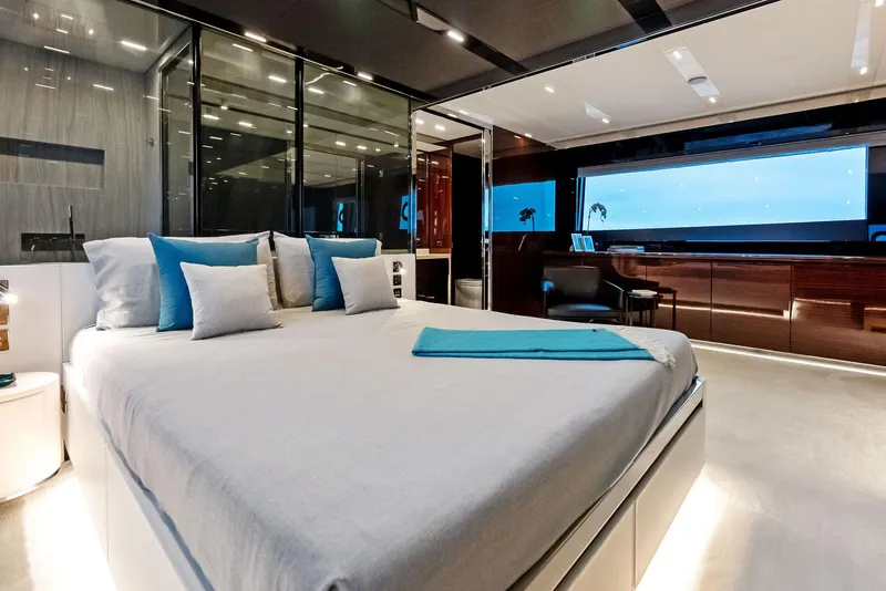 Slide: The Image of Luxurious bedroom interior of 2021 Riva 88' FOLGORE yacht with modern design and ocean view. - 39