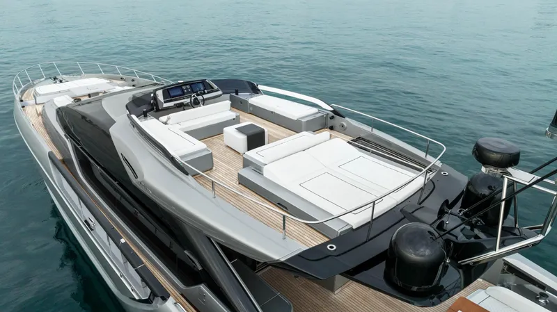 Slide: The Image of Luxurious 2021 Riva 88 Folgore yacht with spacious deck and modern design on calm water. - 4