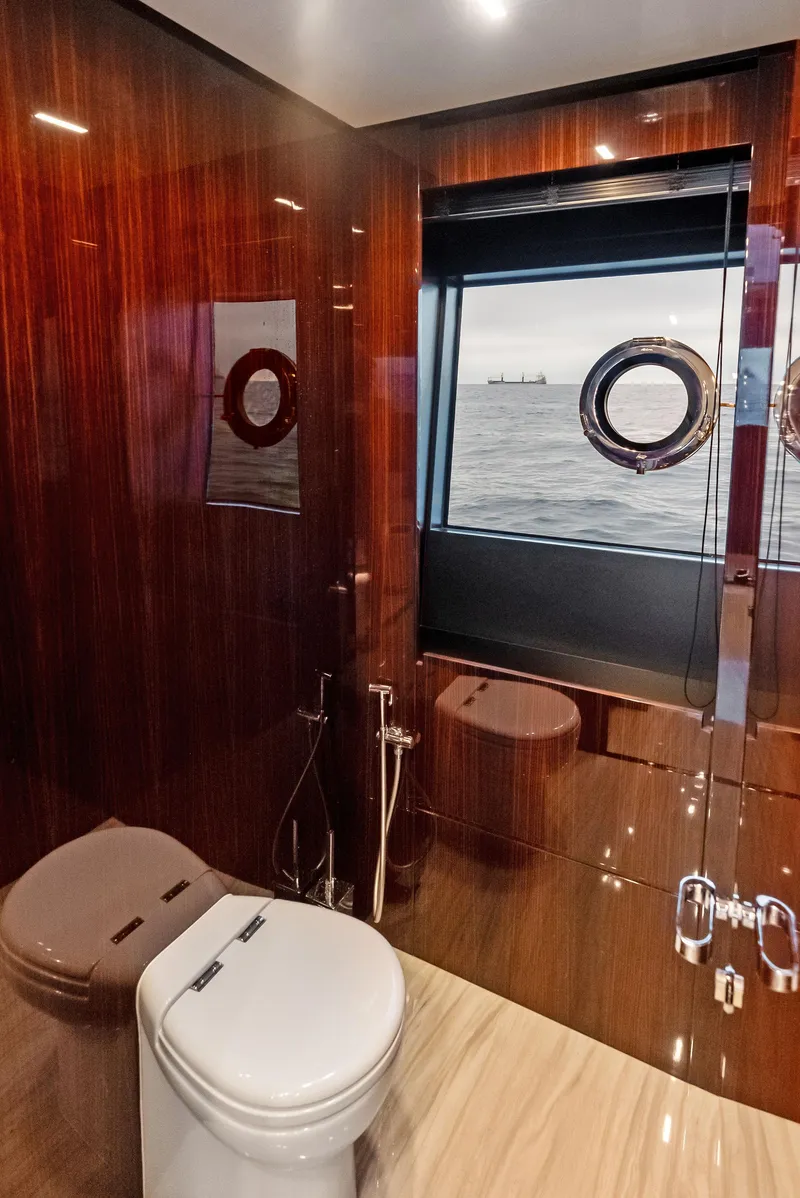 Slide: The Image of Luxurious bathroom on 2021 Riva 88' FOLGORE yacht with ocean view. - 42