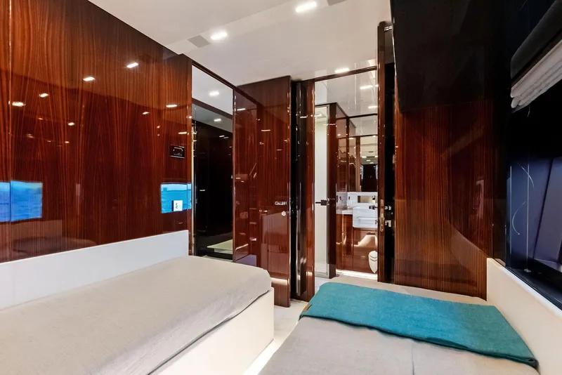 Slide: The Image of Luxurious interior cabin of 2021 Riva 88' FOLGORE yacht with modern wood finishes. - 46