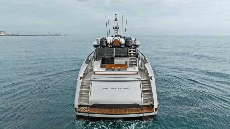Slide: The Image of Riva 88' FOLGORE 2021 luxury yacht on open sea, rear view. - 6