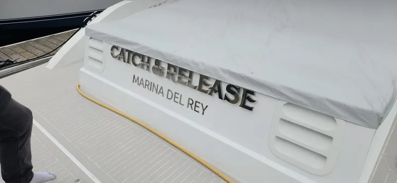 Slide: The Image of Trident Custom 2017 boat named "Catch & Release" docked at Marina del Rey. - 13