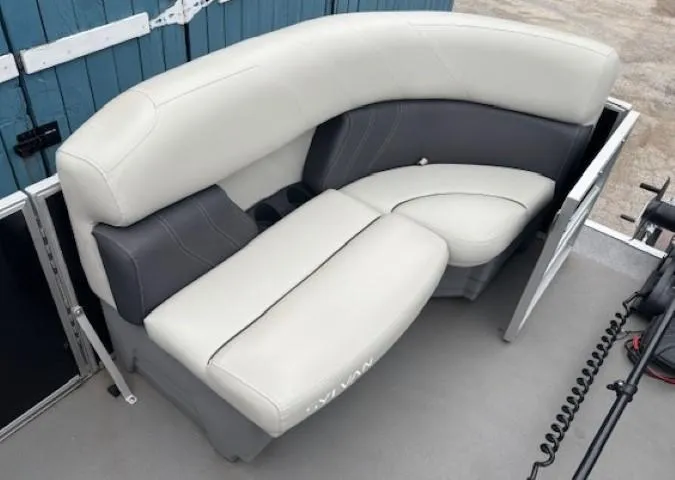 Slide: The Image of 2021 Sylvan Mirage 820 Cruise boat seating with gray and white upholstery. - 9