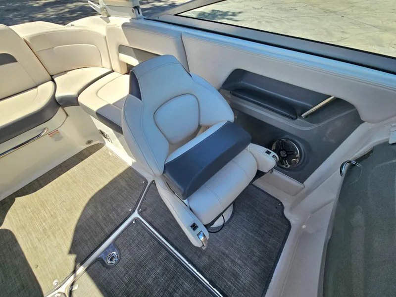 Slide: The Image of 2017 Chaparral 246 SSi boat interior with plush seating and modern design. - 26